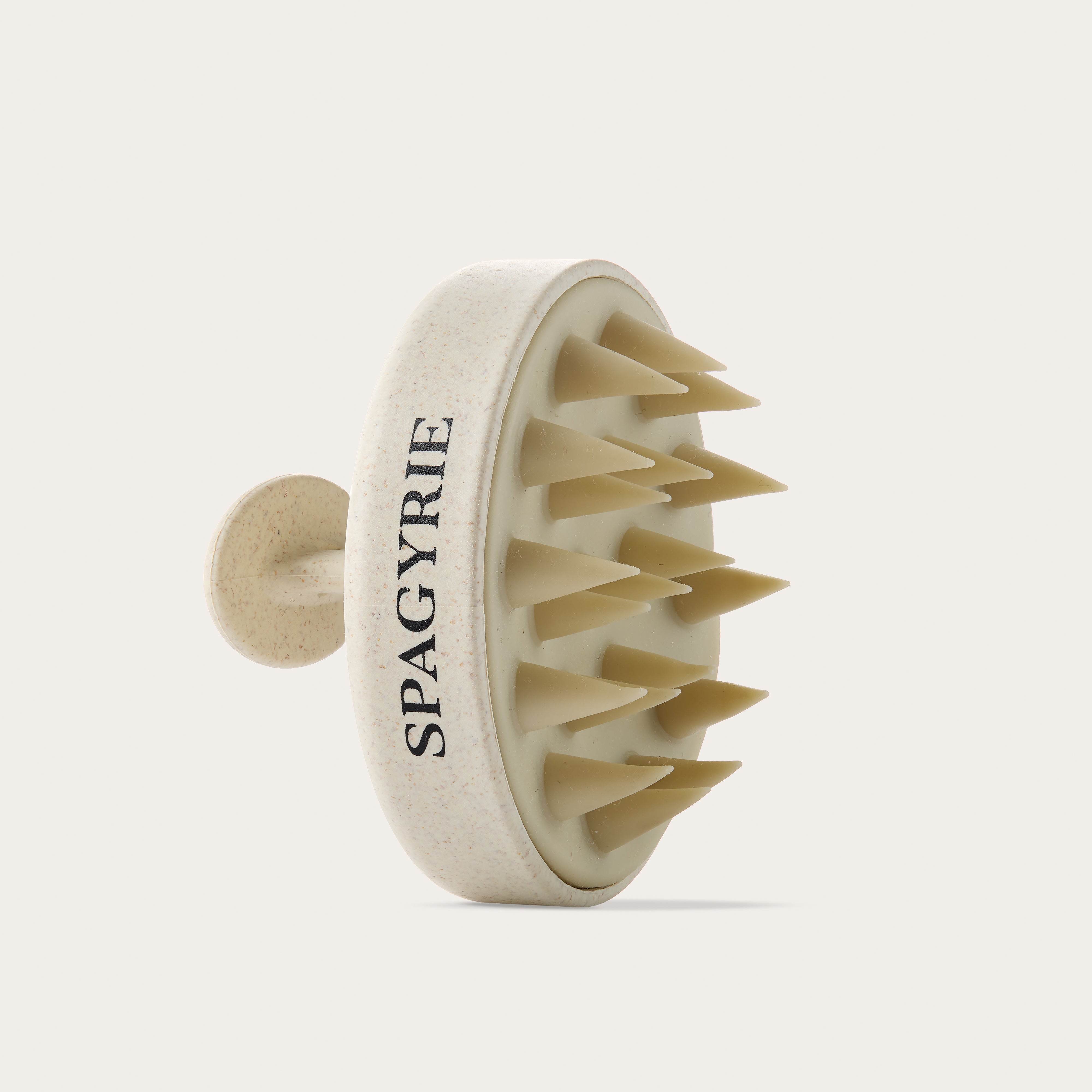 Brosse stimulante cuir chevelu